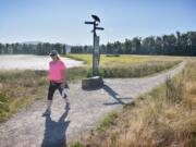 Judy Byron of Washougal takes a morning hike at Steigerwald Lake National Wildlife Refuge in 2019.