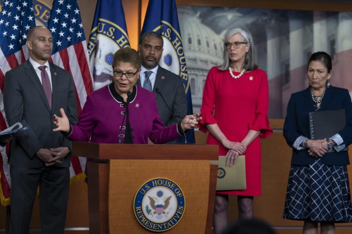 Rep. Karen Bass, D-Calif., chair of the Congressional Black Caucus, speaks to the media as members of the Congressional Tri-Caucus meet with reporters to discusses the 2020 Census on Capitol Hill in Washington, Thursday, March 5, 2020. From left are House Democratic Caucus Chair Hakeem Jeffries, D-N.Y., Bass, Rep. Steven Horsford, D-Nev., 2020 Census Task Force for the Congressional Black Caucus, Democratic Caucus Vice Chair Katherine Clark, D-Mass., and Rep. Deb Haaland, D-N.M., Native American Caucus co-chair. (AP Photo/J.