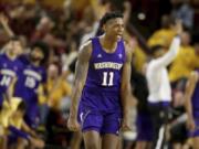 Washington&#039;s Nahziah Carter (11) celebrates a3-pointer against Arizona State late in the second half of an NCAA college basketball game Thursday, March 5, 2020, in Tempe, Ariz. Washington won 90-83.