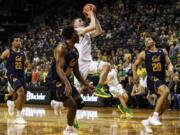 Oregon guard Payton Pritchard (3) shoots against California during the first half during an NCAA college basketball game in Eugene, Ore., Thursday, March 5, 2020.