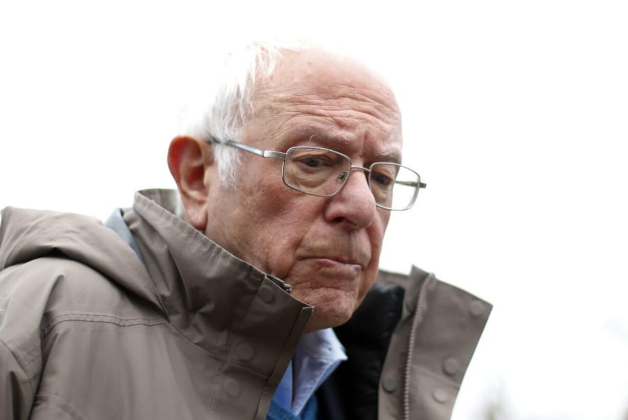 Democratic presidential candidate Sen. Bernie Sanders, I-Vt., visits outside a polling location at Warren E. Bow Elementary School in Detroit, Tuesday, March 10, 2020.