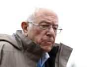 Democratic presidential candidate Sen. Bernie Sanders, I-Vt., visits outside a polling location at Warren E. Bow Elementary School in Detroit, Tuesday, March 10, 2020.