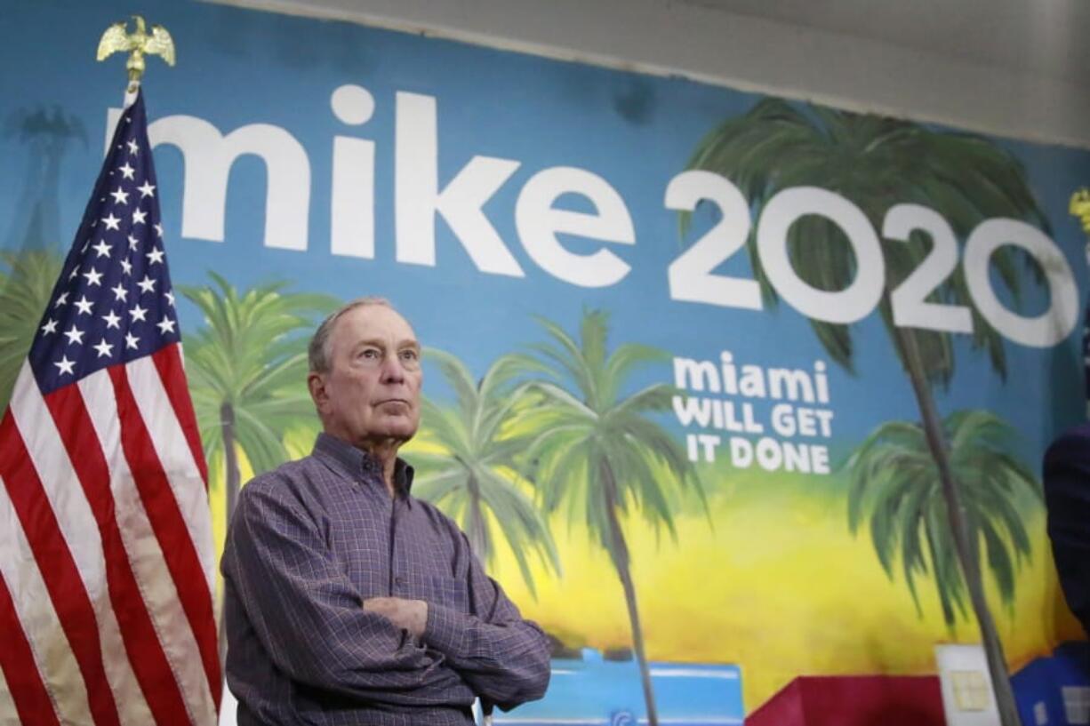 In this March 3, 2020 photo, Democratic presidential candidate former New York City Mayor Mike Bloomberg waits to speak at a news conference, in the Little Havana neighborhood, in Miami.