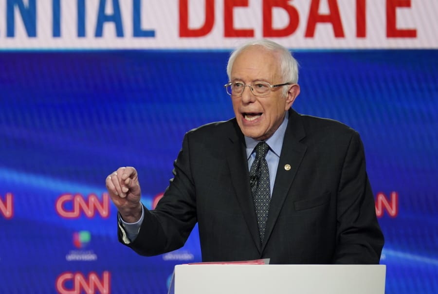 In this Sunday, March 15, 2020, photo, Sen. Bernie Sanders, I-Vt., with former Vice President Joe Biden, speaks during a Democratic presidential primary debate at CNN Studios in Washington. What might be the final showdown between the two very different Democratic candidates takes place Tuesday, March 17, 2020, during Florida&#039;s presidential primary.