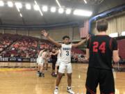 King's Way Christian senior Kobi Cason defends an inbounds pass late in the Knights' 58-57 overtime loss to River View on Friday at the 1A state basketball tournament in Yakima.