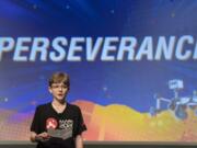 Alex Mather, whose submission, Perseverance, was chosen as the official name of the Mars 2020 rover, reads his essay entry Thursday at Lake in Burke, Va.