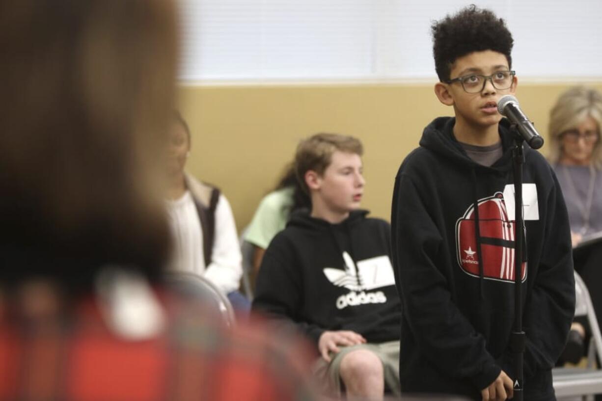 Kane Richey, a fifth grader at Mooreville Elementary School, concentrates as he competes in the Lee County Spelling Bee Tuesday, Feb. 4, 2020 in Tupelo, Miss.