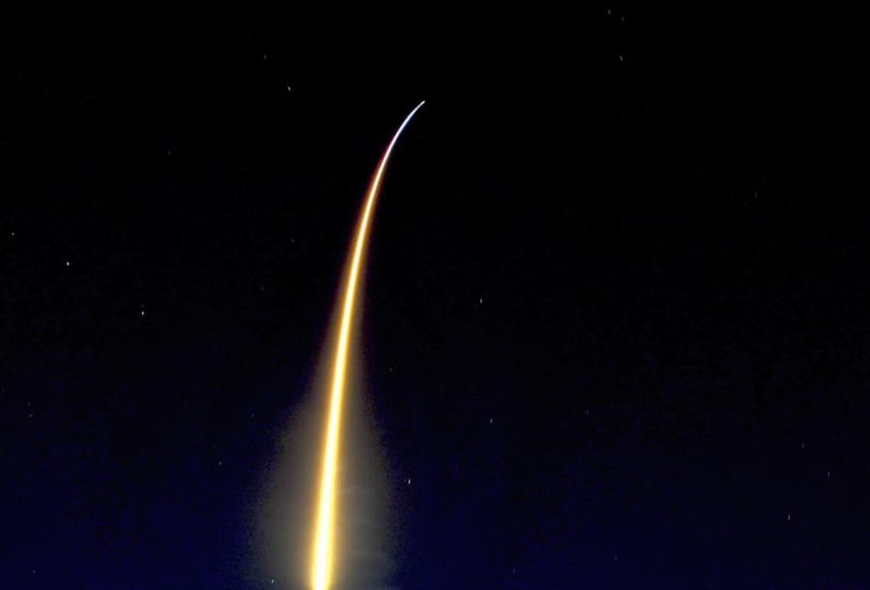 In a time exposure, a SpaceX Falcon is launched from Cape Canaveral, Fla., as seen from Viera, Fla., Friday night, March 6, 2020. The Falcon rocket blasted off with 4,300 pounds (1,950 kilograms) of equipment and experiments for the International Space Station. Just minutes later, the spent first-stage booster made a dramatic midnight landing back at Cape Canaveral, its return accompanied by sonic booms.