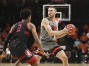 Oregon State&#039;s Tres Tinkle (3) passes around Stanford&#039;s Bryce Wills (2) during the first half of an NCAA college basketball game in Corvallis, Ore., Thursday, March 5, 2020.