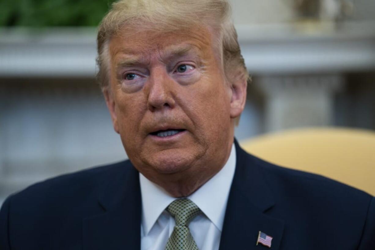 President Donald Trump speaks during a meeting with Irish Prime Minister Leo Varadkar in the Oval Office of the White House, Thursday, March 12, 2020, in Washington.