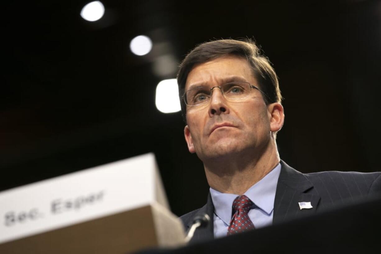 Defense Secretary Mark Esper testifies to the Senate Armed Services Committee about the budget, Wednesday, March 4, 2020, on Capitol Hill in Washington. An uptick in Taliban attacks against Afghan forces that prompted a retaliatory U.S. airstrike has underscored the fragility of the peace deal between the Trump administration and the group. Esper told the Senate hearing that the Taliban are honoring the agreement by not attacking U.S.