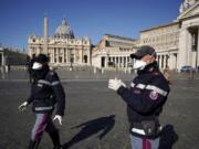 Police officers wearing masks patrol an empty St. Peter&#039;s Square at the Vatican, Wednesday, March 11, 2020. Pope Francis held his weekly general audience in the privacy of his library as the Vatican implemented Italy&#039;s drastic coronavirus lockdown measures, barring the general public from St. Peter&#039;s Square and taking precautions to limit the spread of infections in the tiny city state.For most people, the new coronavirus causes only mild or moderate symptoms, such as fever and cough. For some, especially older adults and people with existing health problems, it can cause more severe illness, including pneumonia.