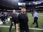 New Orleans Saints head coach Sean Payton looks up as he walks off the field after overtime of an NFL wild-card playoff football game against the Minnesota Vikings, Sunday, Jan. 5, 2020, in New Orleans. The Vikings won 26-20.