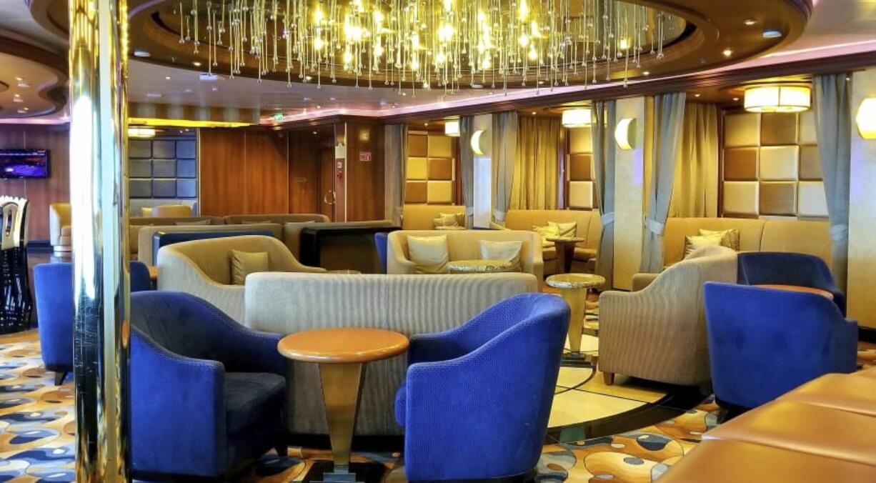 This photo provided by Michele Smith shows an empty lounge area on the Grand Princess cruise ship Friday, March 6, 2020, off the California coast. Scrambling to keep the coronavirus at bay, officials ordered a cruise ship with about 3,500 people aboard to stay back from the California coast until passengers and crew can be tested.