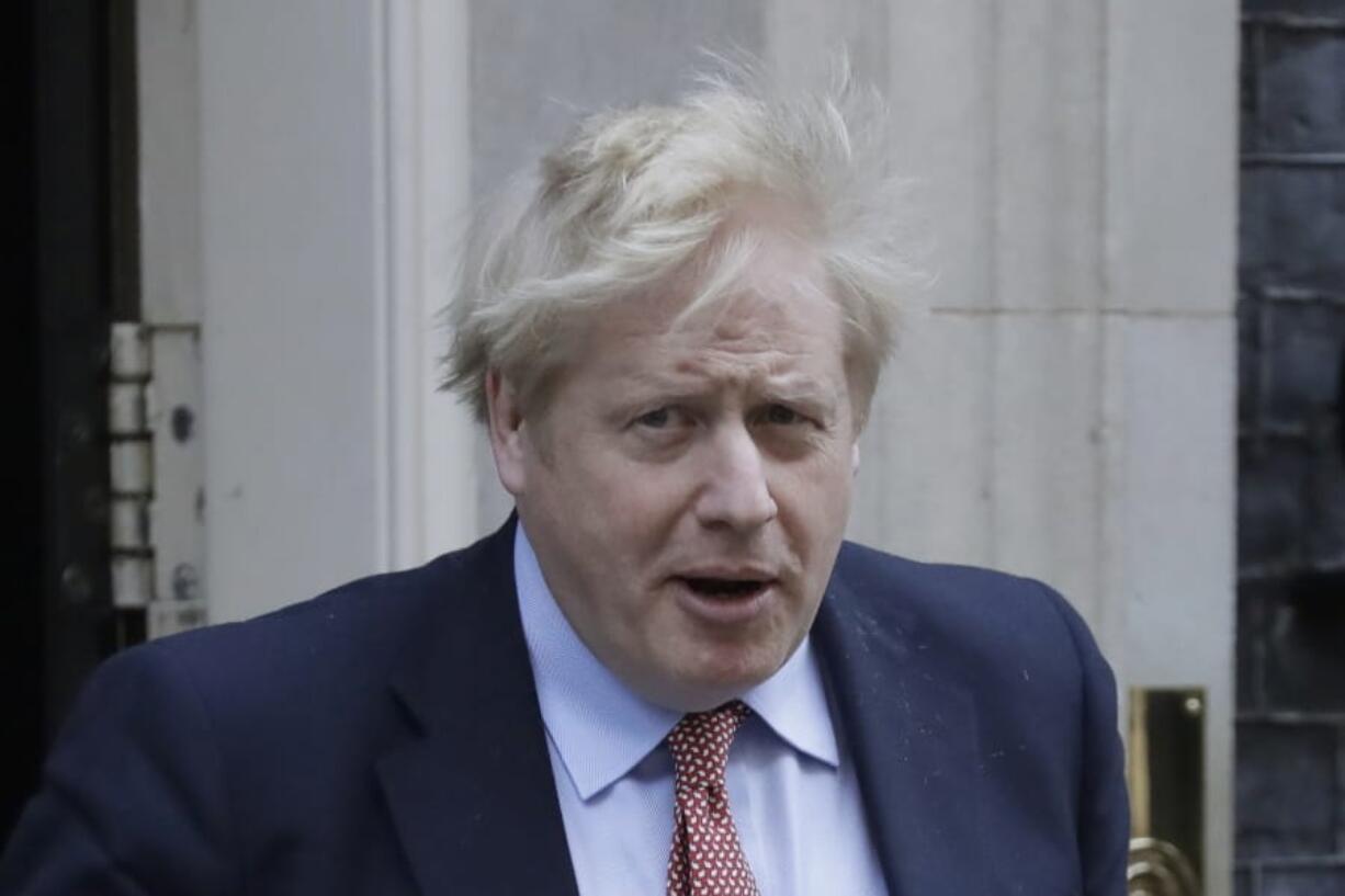 FILE - In this Wednesday, March 25, 2020 file photo Britain&#039;s Prime Minister Boris Johnson leaves 10 Downing Street for the House of Commons for his weekly Prime Ministers Questions, in London. British Prime Minister Boris Johnson has tested positive for the new coronavirus. Johnson&#039;s office said Friday March 27, 2020 that he was tested after showing mild symptoms, Downing St. says Johnson is self-isolating and continuing to lead the country&#039;s response to COVID-19.