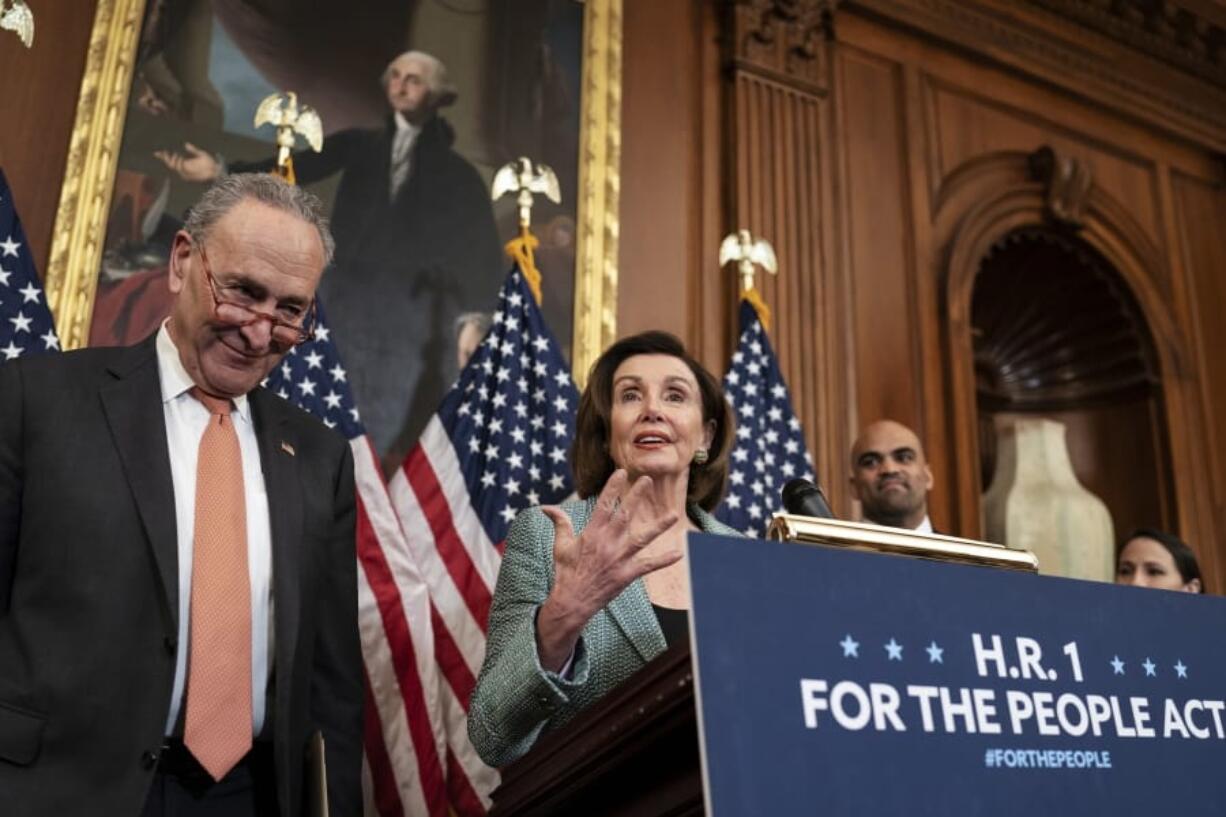 Senate Minority Leader Chuck Schumer, D-N.Y., left, and Speaker of the House Nancy Pelosi, D-Calif., call on Senate Majority Leader Mitch McConnell, R-Ky., to bring the Democrats&#039; HR-1 &quot;For the People Act&quot; to the floor for a vote, during an event on Capitol Hill in Washington, Tuesday, March 10, 2020. (AP Photo/J.