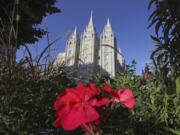 The Salt Lake Temple at Temple Square in Salt Lake City. The Church of Jesus Christ of Latter-day Saints has postponed a key meeting of top global leaders scheduled for April 1-2 because of the spread of the coronavirus around the world. The faith is also discouraging members from traveling from outside the United States for a twice-yearly conference set for the weekend of April 4-5 in Salt Lake City, the religion said in a news release Thursday.