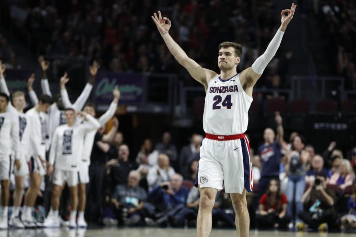 Gonzaga&#039;s Corey Kispert (24) celebrates after a teammate scored a 3-point shot against Saint Mary&#039;s in the first half of an NCAA college basketball game in the final of the West Coast Conference men&#039;s tournament Tuesday, March 10, 2020, in Las Vegas.