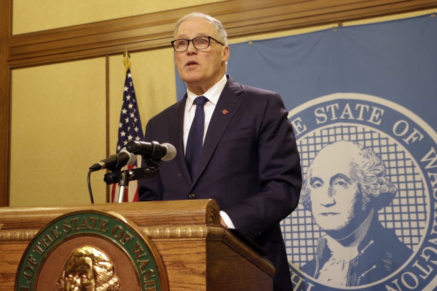 Washington Gov. Jay Inslee speaks to the media after the Legislature adjourned its 60-day session, Thursday, March 12, 2020, in Olympia, Wash. State lawmakers passed a supplemental budget with funding for the state&#039;s response to COVID-19.