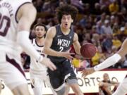 Washington State forward CJ Elleby (2) drives past Arizona State guard Alonzo Verge Jr. (11) during the first half of an NCAA college basketball game Saturday, March 7, 2020, in Tempe, Ariz.