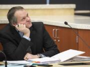 County Manager Shawn Henessee watches a video presentation during a Clark County Council meeting at the Public Service Center in January 2019.