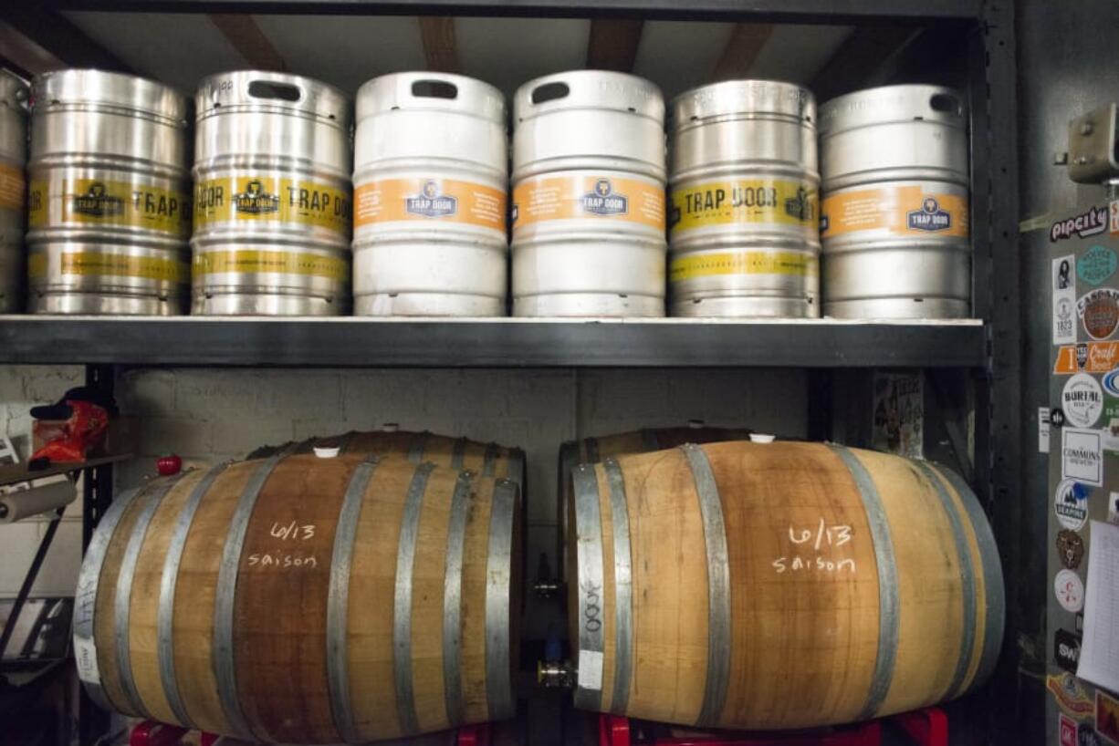 Kegs and casks are stored at Trap Door Brewing.