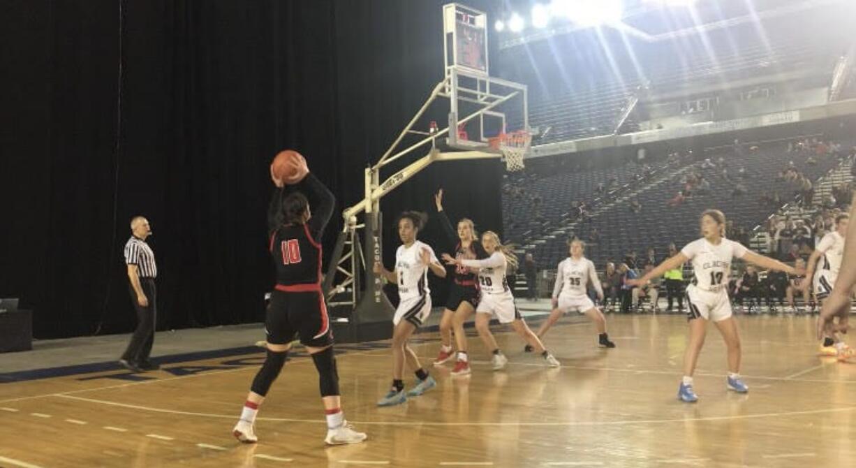 Katelynn Forner (10) looks to enter a pass in the post during Wednesday's Round-of-12 game at the Tacoma Dome.