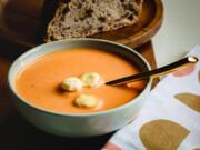 Puree the cream of tomato soup if you want it silky or leave the tomatoes chunky and add more vegetables to make a sturdier soup. (E.