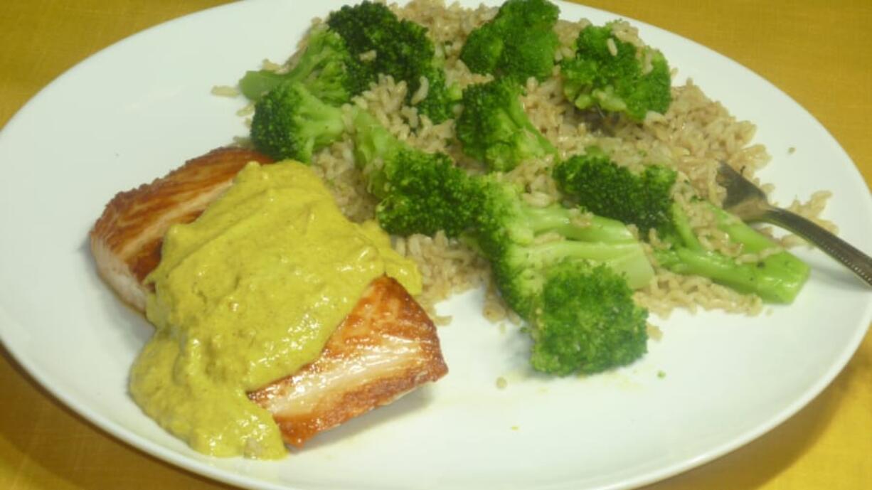 Pan Roasted Salmon with Curry Sauce and Basmati Rice and Broccoli.