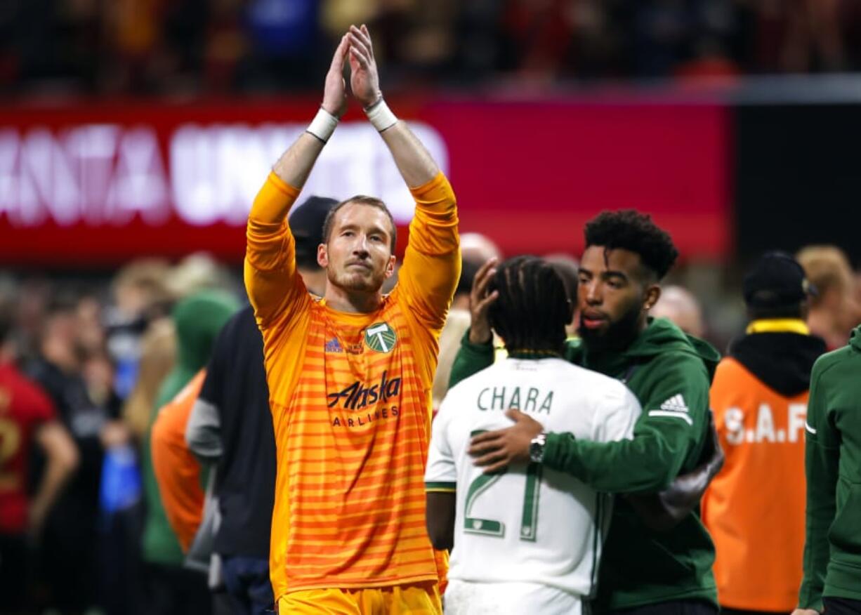 Portland Timbers goalkeeper Jeff Attinella, center left, is also a children&#039;s book author, with five titles to his credit. He writes Dr. Seuss-style rhymes about his favorite sporting events, publishing them through his own company. He&#039;s now offering free downloads of the books while families are quarantining because of the coronavirus.