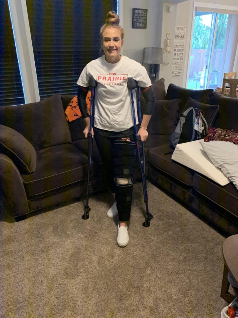 Amelia Renner on the crutches she used for four months after two surgeries on her left knee (Photo provided by Renner family)