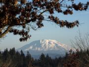 A fresh blanket of snow is visible on Mount St. Helens from the Washington State University Vancouver campus on Dec. 6, 2018. Seasonal temperatures in the upper 40s and lows in the upper 30s to low 40s are expected throughout the weekend.