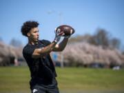 Fort Vancouver High graduate Jordan Suell runs through drills at Hudson&#039;s Bay High School in Vancouver. After a standout career at Southern Oregon University, the 6-foot-6 receiver has been training in hopes he&#039;ll be selected in the late rounds of this week&#039;s NFL Draft.