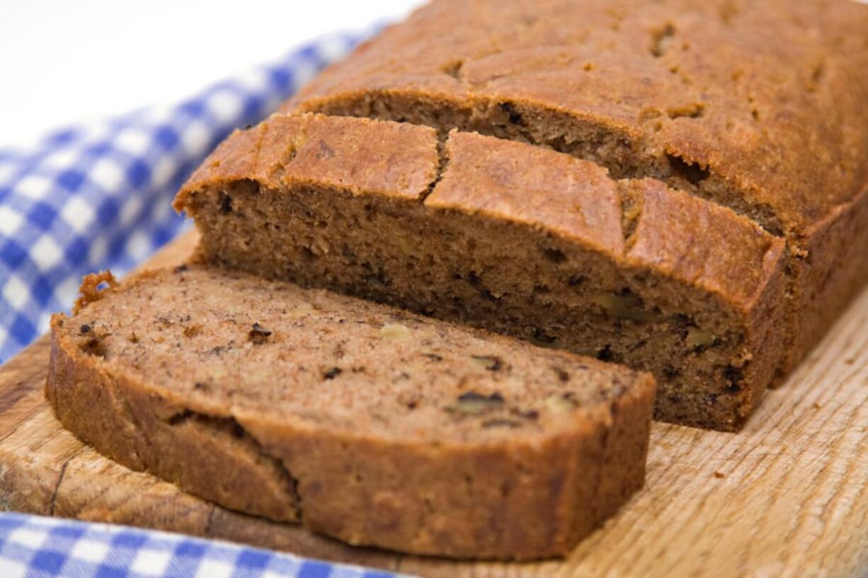 A fresh homemade loaf of banana walnut bread.