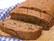 A fresh homemade loaf of banana walnut bread.