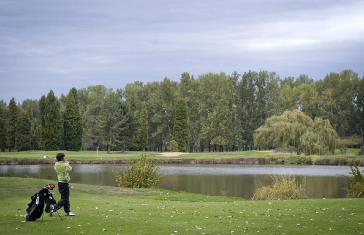 Portland area golf courses like Heron Lakes are seeing an influx of players from Southwest Washington with courses in Washington shut down due to pandemic concerns.