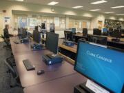 Clark College student Alex Belza, 16, works in an empty computer lab at Scarpelli Hall that allowed extra space for social distancing on Monday morning. Clark College announced on Friday it would extend distance learning through the fall quarter.