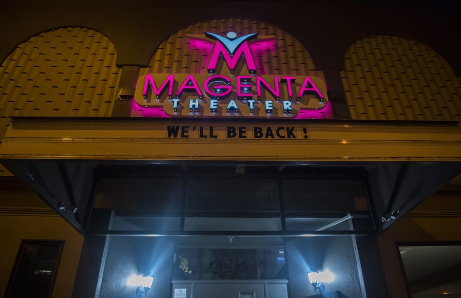 A sign outside Magenta Theater on Main Street in downtown Vancouver reassures the public of their return, as seen March 27.