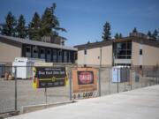 Construction continues at McLoughlin Middle School and George C. Marshall Elementary School in Vancouver on Thursday. School construction can continue despite moratoriums on most residential and commercial construction.