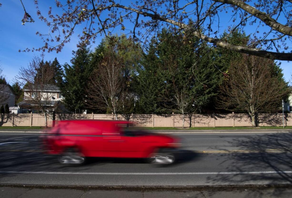 A vehicle drives along Northwest Lakeshore Avenue last week. The novel coronavirus pandemic has reduced traffic, but increased speeding.