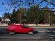 A vehicle drives along Northwest Lakeshore Avenue last week. The novel coronavirus pandemic has reduced traffic, but increased speeding.