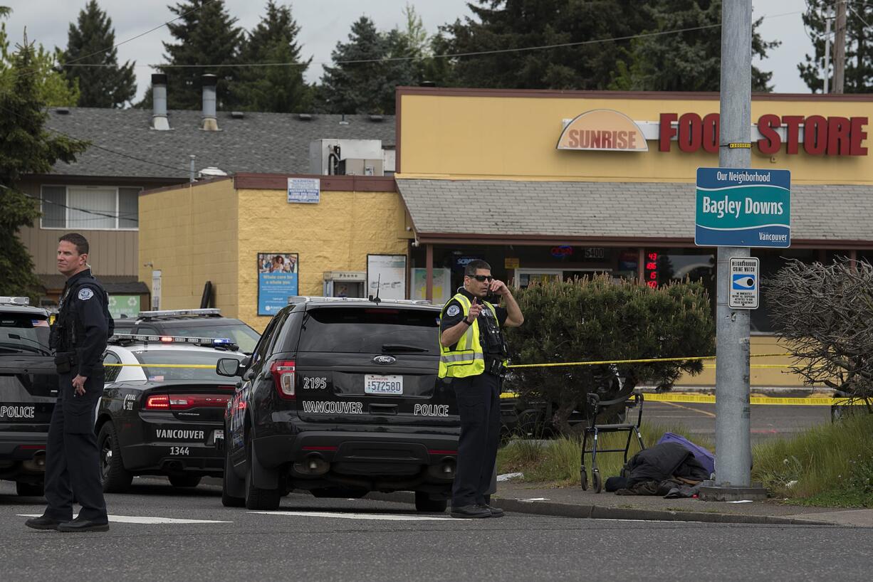 Police at the scene of the fatal shooting of William Abbe on Fourth Plain Boulevard and Stapleton Road on April 28, 2020.