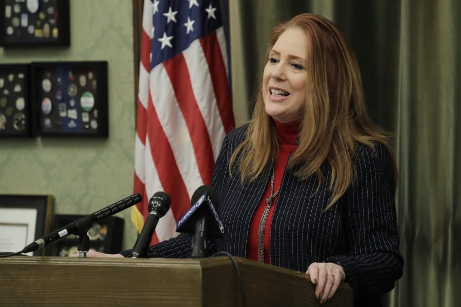 Washington Secretary of State Kim Wyman talks to reporters in her office, Wednesday, Jan. 15, 2020, at the Capitol in Olympia, Wash. Wyman was talking about a series of election- and ballot-security bills her office is asking the Washington Legislature to consider during the current session. (AP Photo/Ted S.