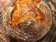 A freshly-baked loaf of sourdough bread appears at a home in London. With millions of people across the globe working at home due to lockdown measures imposed during the coronavirus pandemic, many people are choosing to make their own bread, rather than venturing to the local store to buy their weekly fix.