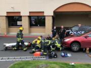 Vancouver Fire Department crews were dispatched Wednesday to a shopping center parking lot at 5000 E. Fourth Plain Blvd., after a car struck a man, pinning him underneath. Vancouver police later said the man, who was skateboarding, was intentionally run over and died of his injuries. The driver, identified by police as Joshua L. Jones, was arrested on suspicion of second-degree murder.