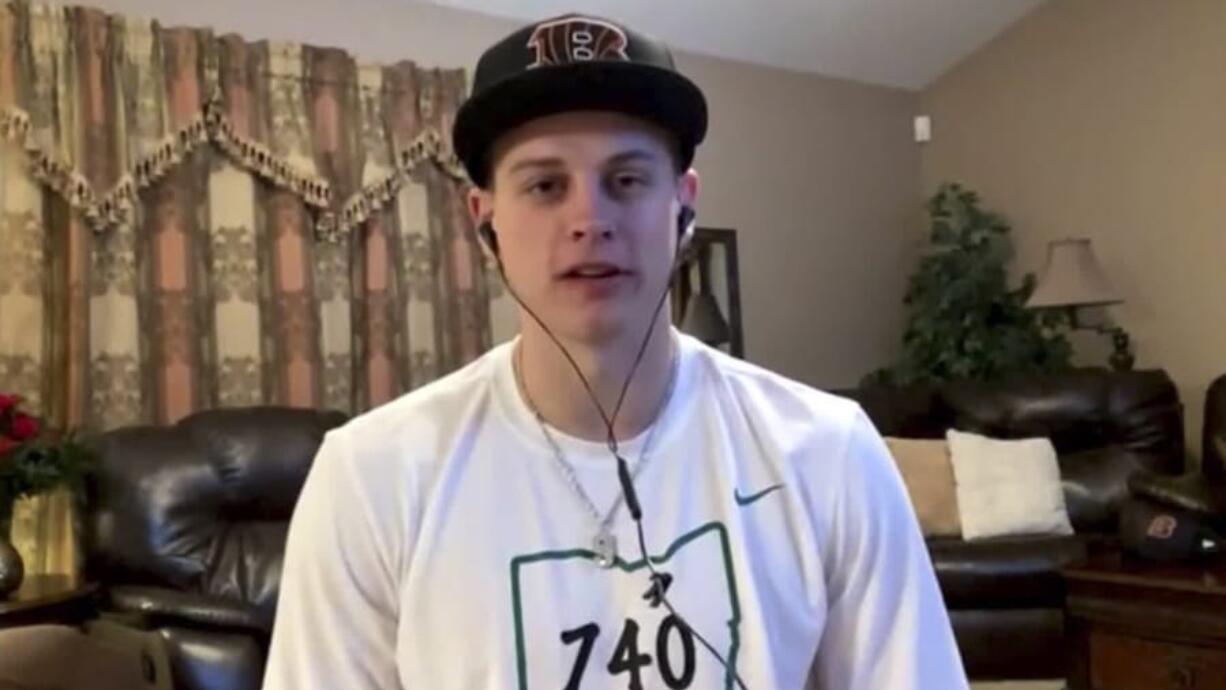 In this still image from video provided by the NFL, LSU quarterback Joe Burrow appears in The Plains, Ohio, during the NFL football draft Thursday, April 23, 2020.