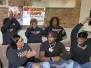 In this still image from video provided by the NFL, Tee Higgins, front center, is selected by the Cincinnati Bengals in the second round of the NFL football draft, Friday, April 24, 2020.