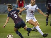 Washington State forward Morgan Weaver (6) was selected by the Portland Thorns with the second pick in the National Women&#039;s Soccer League draft. The league was supposed to start its season this weekend.