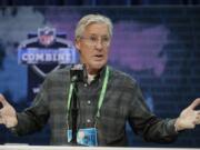 FILE - In this Feb. 25, 2020, file photo, Seattle Seahawks head coach Pete Carroll speaks during a press conference at the NFL football scouting combine in Indianapolis. The NFL Draft is April 23-25.