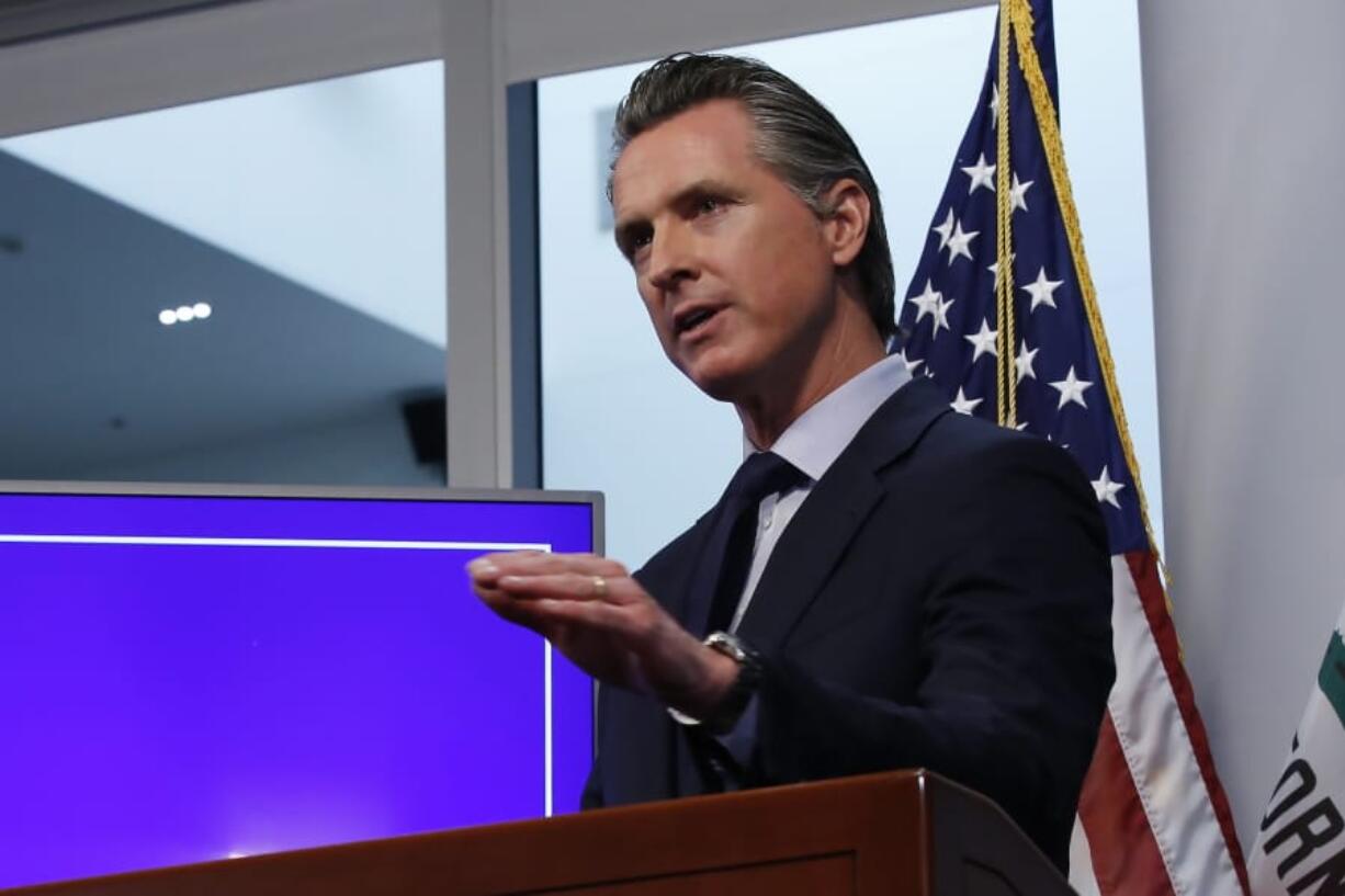 FILE-- In this Tuesday April 14, 2020, file photo, California Gov. Gavin Newsom discusses an outline for what it will take to lift coronavirus restrictions, during a news conference at the Governor&#039;s Office of Emergency Services in Rancho Cordova, Calif. On Wednesday, April 22, Newson announced hospitals can resume scheduled surgeries. It&#039;s the first significant change to the state&#039;s stay-at-home order.